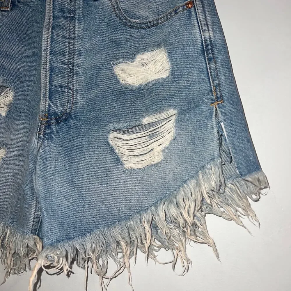 Free people baggy tomboy distressed denim shorts size 25